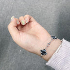 ¡®Jewelicorn¡¯CLOVER 5 MOTIF VEINED ONYX BRACELET SILVER